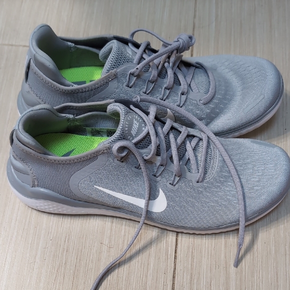 Nike Men’s Grey Running Shoes with White Swoosh